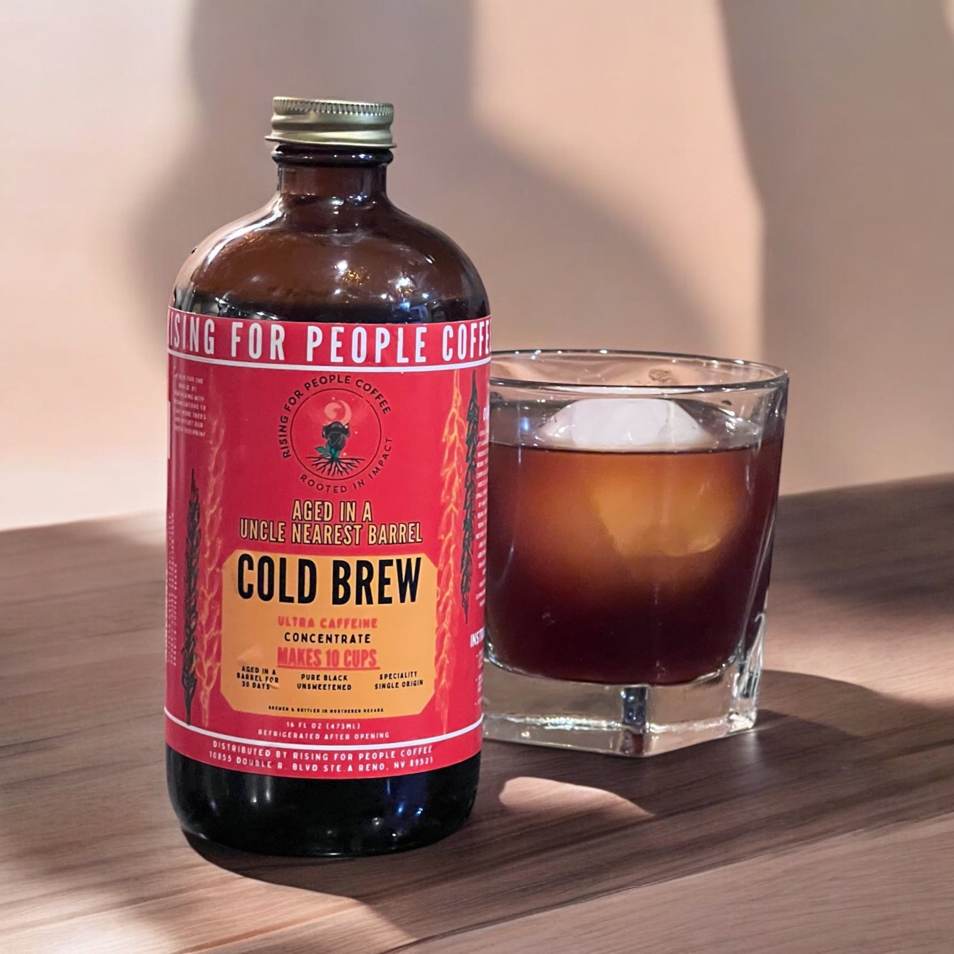 Aged Whiskey Barrel Concentrated Cold Brew Coffee - Rising For People Coffee Co.CoffeeRising For People Coffee Co.Rising For People Coffee Co.Rising for People Coffee cold brew concentrated coffee bottle - organic specialty Guatemala coffee aged in an uncle nearest whiskey barrel for 30 days, roast light, ultra caffeine perfect organic gourmet coffee for lattes, baking, cooking, culinary use, Reno coffee near me, Latte, Cappuccino, Coffee shop, Coffee shop near, Coffee near me, Roasted coffee, S