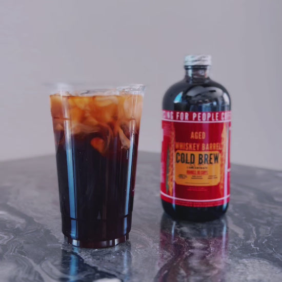 Rising for People Cold Brew bottle- organic specialty Guatemala coffee aged in an uncle nearest whiskey barrel for 30 days, roast light, ultra caffeine perfect organic gourmet coffee for lattes, baking, cooking, culinary use, Reno coffee near me, Latte,
Cappuccino, 
Coffee shop,
Coffee shop near, 
Coffee near me,
Roasted coffee,
Speciality coffee,
Green coffee,
Black coffee,
Espresso machine,
French press,
Espresso,
Takeout coffee near
